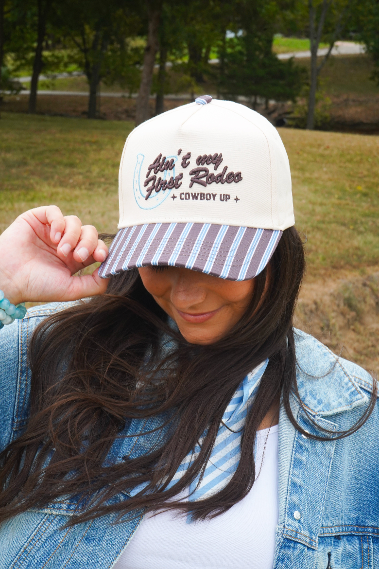 Ain't My First Rodeo Trucker Hat