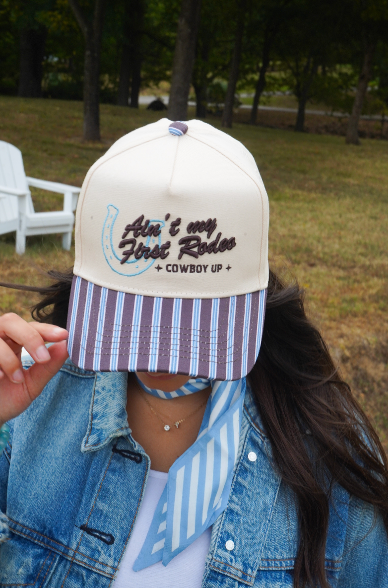 Ain't My First Rodeo Trucker Hat